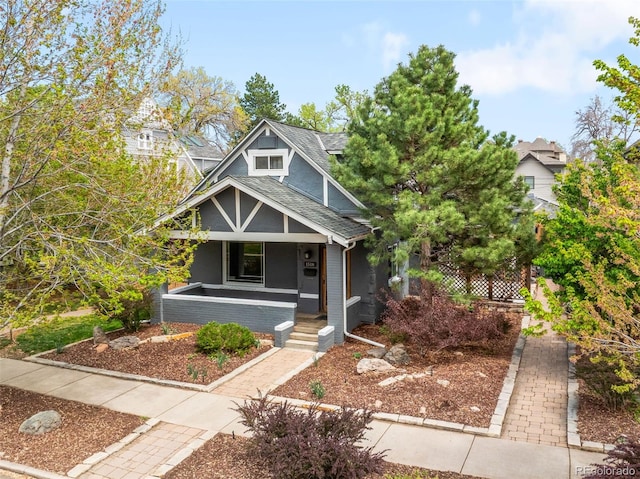 1518-1520 S Sherman St, Denver, CO 80210 - bungalow-style home with a shingled roof and covered porch