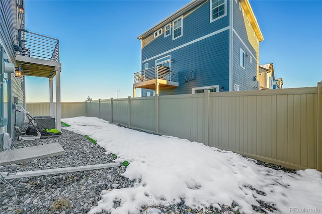 view of yard covered in snow