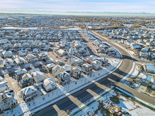 4072 N Rome St, Aurora, CO 80019 - aerial view of property and surrounding area with nearby suburban area and a mountainous background