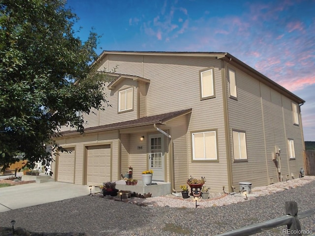 view of front of home with a garage