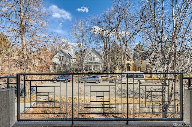 view of gate featuring a residential view