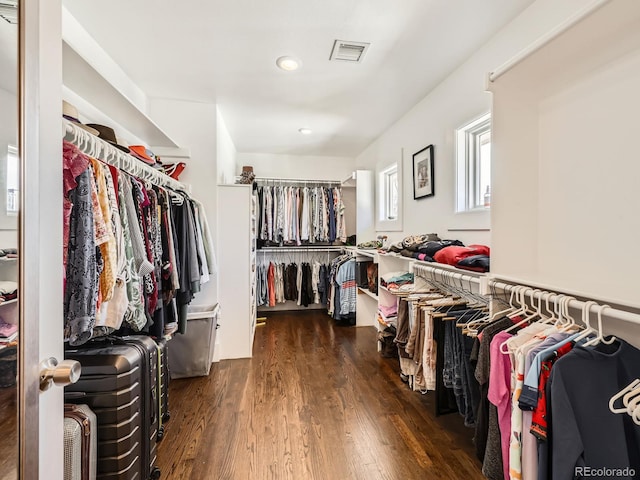 spacious closet with visible vents and wood finished floors