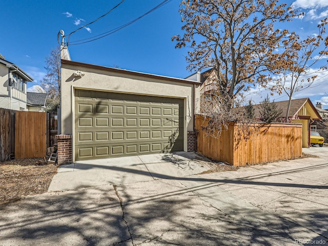 garage with fence