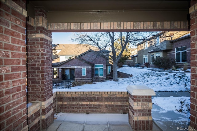 view of snow covered patio