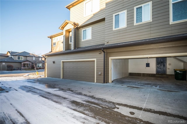 exterior space with a garage