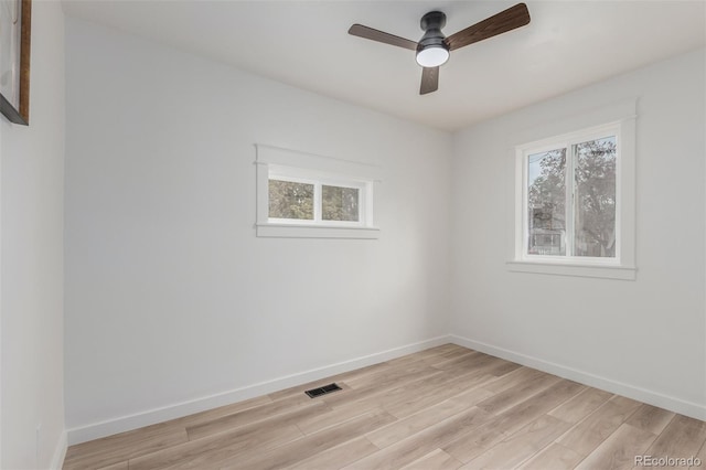 empty room featuring light hardwood / wood-style floors and ceiling fan