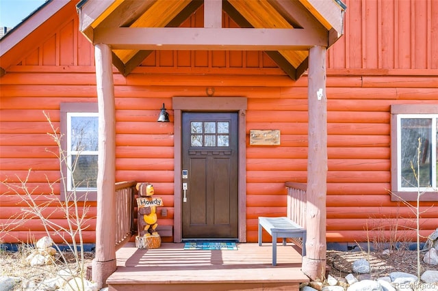 82 Sheep Ridge Rd, Fairplay, CO 80440 - doorway to property featuring board and batten siding, crawl space, and faux log siding