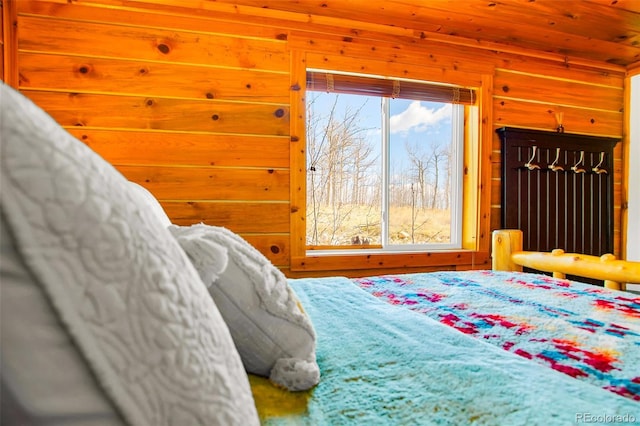 82 Sheep Ridge Rd, Fairplay, CO 80440 - bedroom with wooden walls and wood ceiling