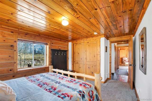 82 Sheep Ridge Rd, Fairplay, CO 80440 - carpeted bedroom featuring wooden ceiling and baseboards