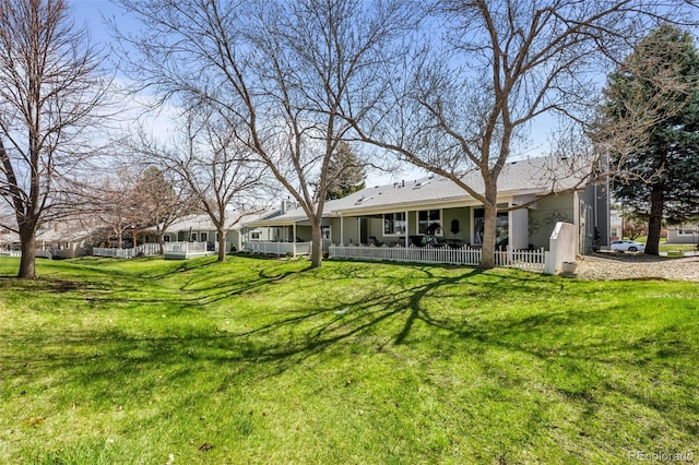 back of property with covered porch