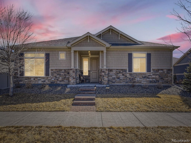 view of front of property featuring stone siding