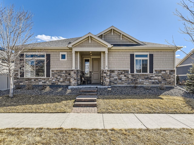 view of front facade featuring stone siding