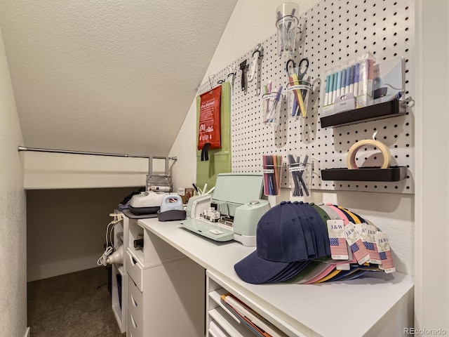 office space with lofted ceiling, baseboards, a textured ceiling, and carpet flooring