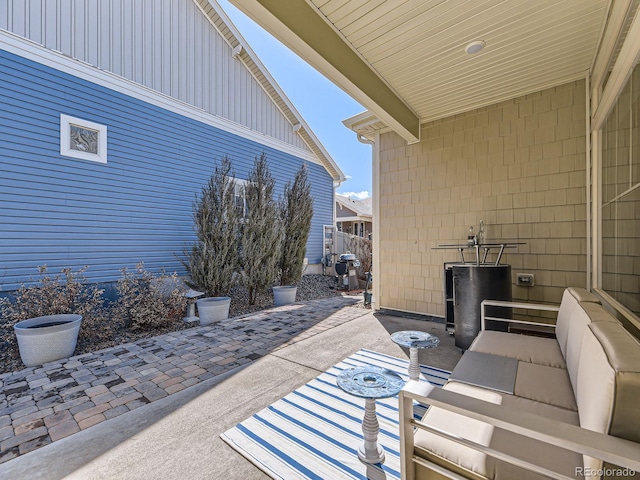 view of patio with a grill