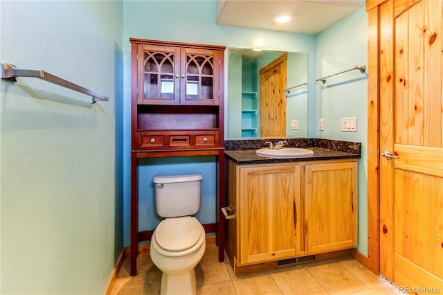 2177 County Road 341, Westcliffe, CO 81252 - bathroom featuring toilet, tile patterned flooring, and vanity