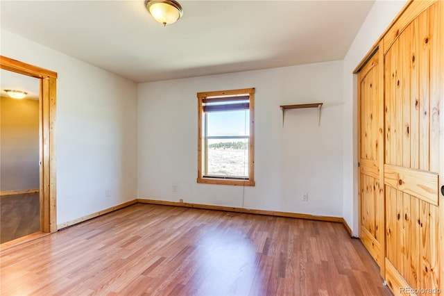 2177 County Road 341, Westcliffe, CO 81252 - unfurnished bedroom with light wood-type flooring, baseboards, and a closet
