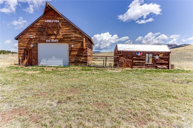 2177 County Road 341, Westcliffe, CO 81252 - view of yard featuring a garage and an outbuilding