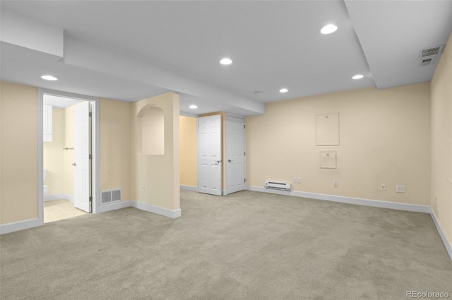 basement with recessed lighting, baseboards, visible vents, and carpet