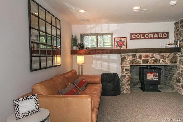 135 Nugget Ln, Alma, CO 80420 - carpeted living area with a wood stove