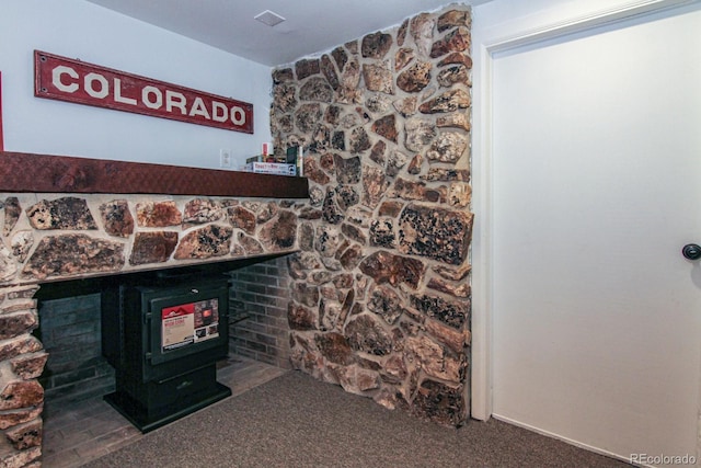 135 Nugget Ln, Alma, CO 80420 - detailed view of carpet and a wood stove
