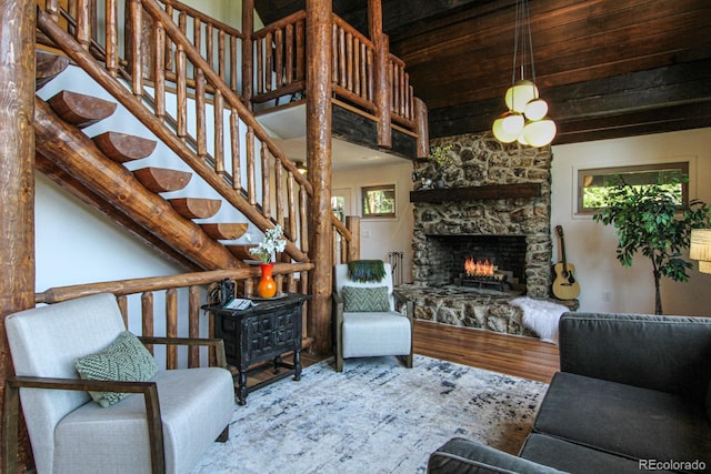 135 Nugget Ln, Alma, CO 80420 - living room featuring wood finished floors, stairs, and a fireplace