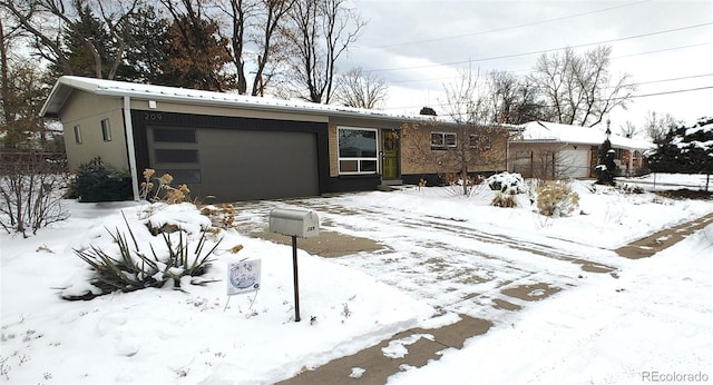 view of front of property featuring a garage