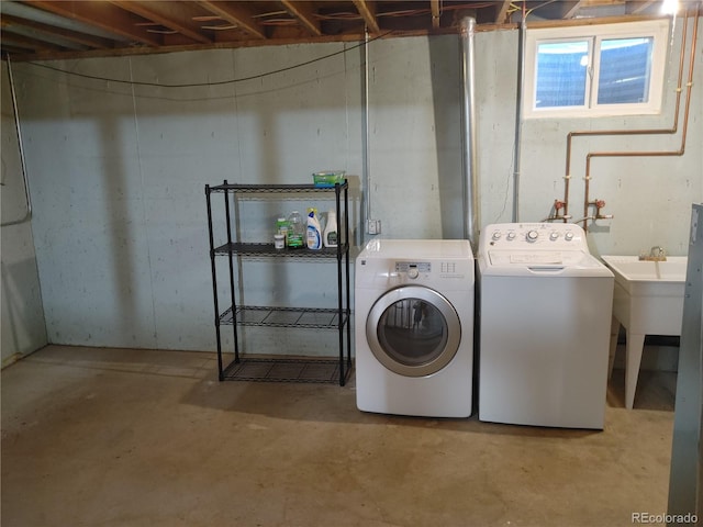 laundry room featuring laundry area and washer and clothes dryer