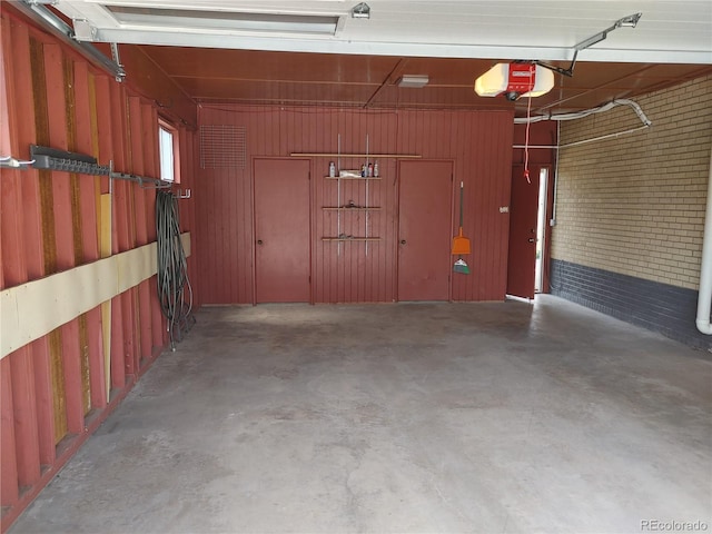 garage featuring a garage door opener