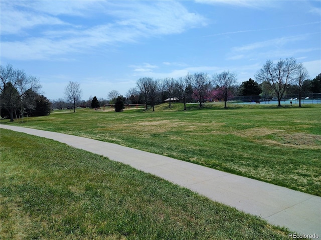 view of community with a lawn