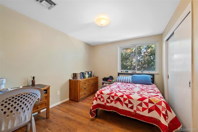 bedroom featuring light hardwood / wood-style flooring