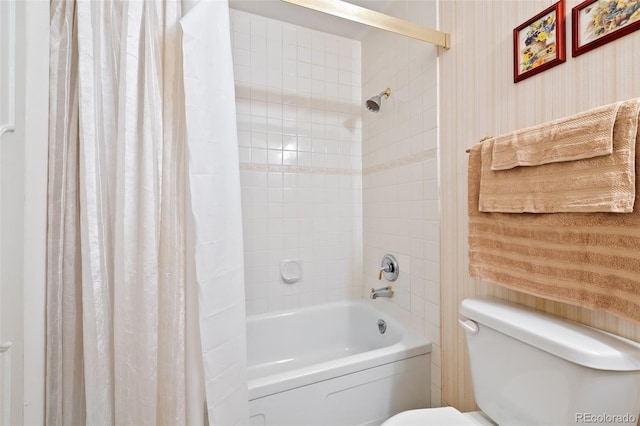 bathroom with toilet and shower / bathtub combination with curtain