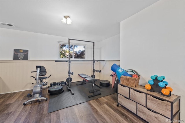 exercise area with hardwood / wood-style flooring