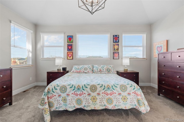 bedroom featuring light colored carpet and vaulted ceiling