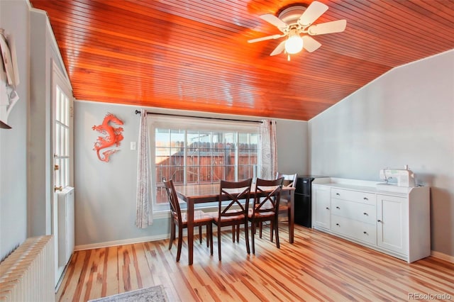 8001 W 57th Ave, Arvada, CO 80002 - dining space with wood ceiling, lofted ceiling, radiator, light wood-style floors, and a ceiling fan