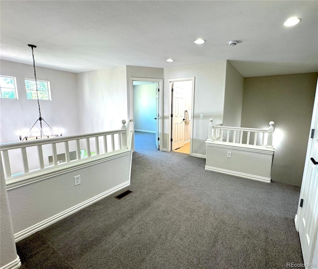12743 W Bowles Pl, Littleton, CO 80127 - carpeted spare room with recessed lighting, baseboards, and a chandelier
