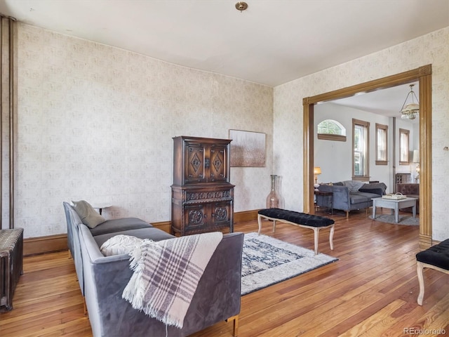 3 S Newton St, Denver, CO 80219 - living area featuring hardwood / wood-style floors and wallpapered walls
