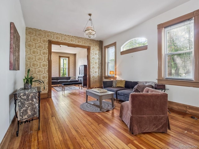 3 S Newton St, Denver, CO 80219 - living room featuring hardwood / wood-style flooring and wallpapered walls