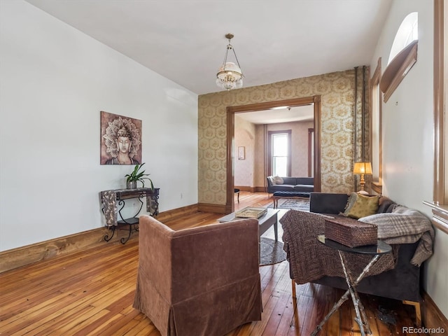 3 S Newton St, Denver, CO 80219 - living room with hardwood / wood-style flooring and wallpapered walls