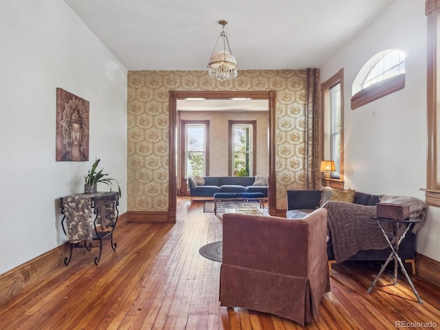 3 S Newton St, Denver, CO 80219 - living area with wood-type flooring and wallpapered walls