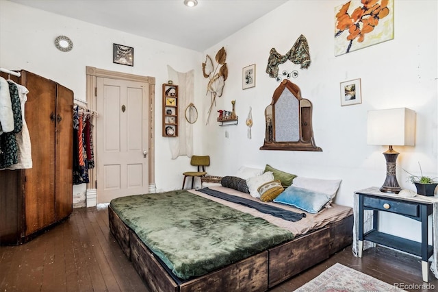 3 S Newton St, Denver, CO 80219 - bedroom featuring hardwood / wood-style flooring