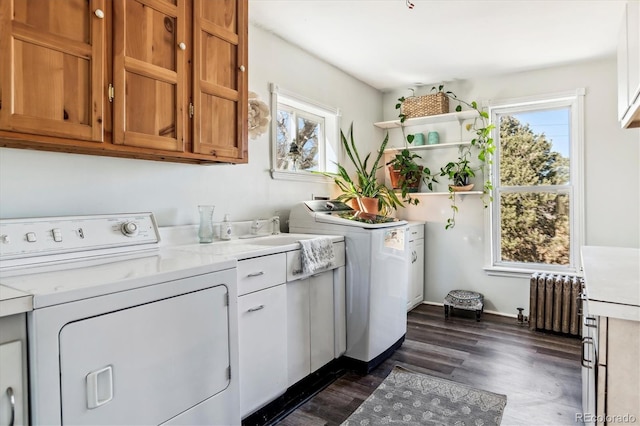 3 S Newton St, Denver, CO 80219 - washroom with radiator heating unit, cabinet space, separate washer and dryer, and dark wood-style floors