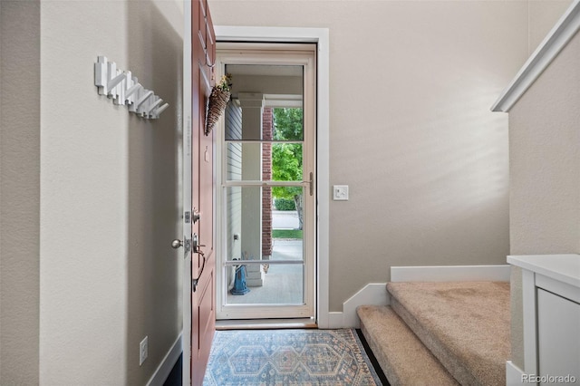 10388 Rutledge St, Parker, CO 80134 - doorway to outside with baseboards and stairs
