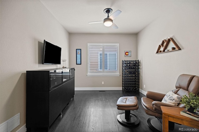 10388 Rutledge St, Parker, CO 80134 - sitting room with dark wood finished floors and a ceiling fan