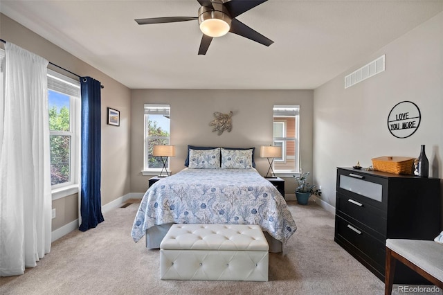 10388 Rutledge St, Parker, CO 80134 - carpeted bedroom featuring multiple windows and ceiling fan