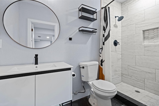 10388 Rutledge St, Parker, CO 80134 - bathroom featuring vanity and tiled shower