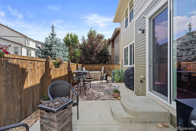 10388 Rutledge St, Parker, CO 80134 - fenced backyard featuring a patio and a grill