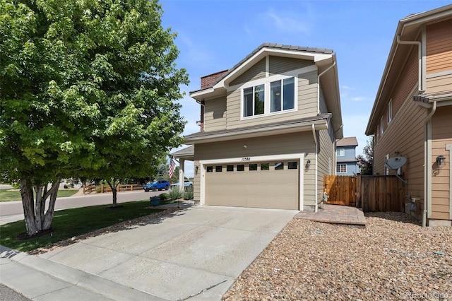 10388 Rutledge St, Parker, CO 80134 - traditional-style home featuring an attached garage and driveway