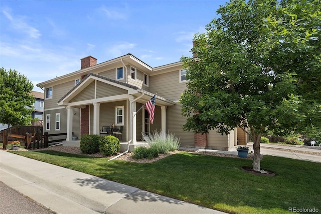 10388 Rutledge St, Parker, CO 80134 - view of front facade with covered porch and a chimney