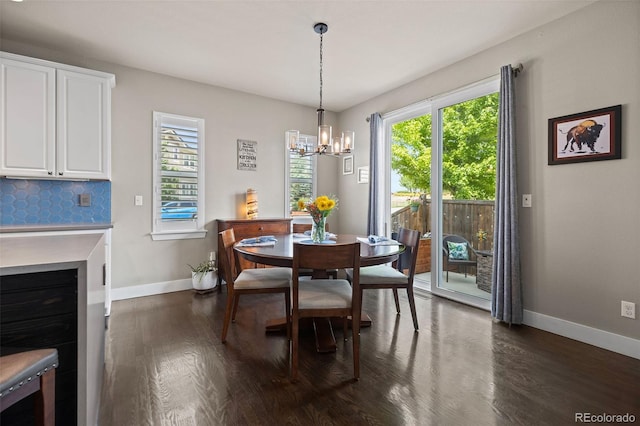 10388 Rutledge St, Parker, CO 80134 - dining space with dark wood-style flooring and a chandelier