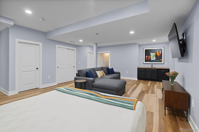 10388 Rutledge St, Parker, CO 80134 - bedroom with light wood-style flooring and recessed lighting
